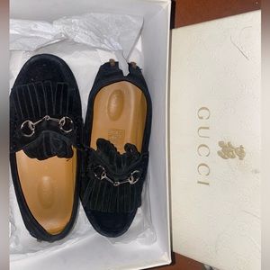 I’m selling some 2 pair of Gucci loafers for kids and a pair of Fendi boots…